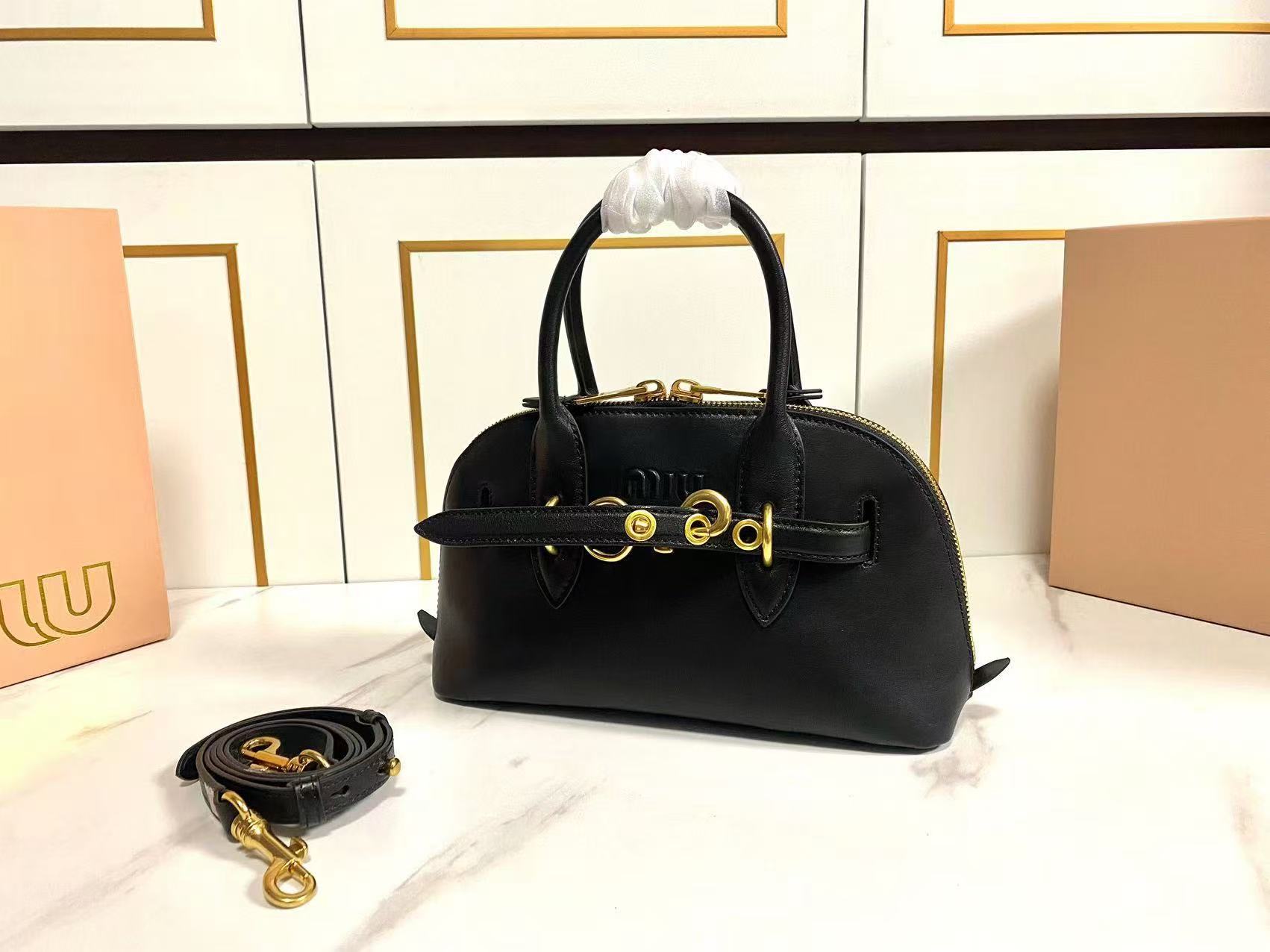 0e27c43cd3483ecae41a95ae1992780b Miu Miu-Style Round Handle Tote – Iconic Circular Ring, Embroidered Logo, Premium Leather Handbag with Detachable Strap - 图片 1