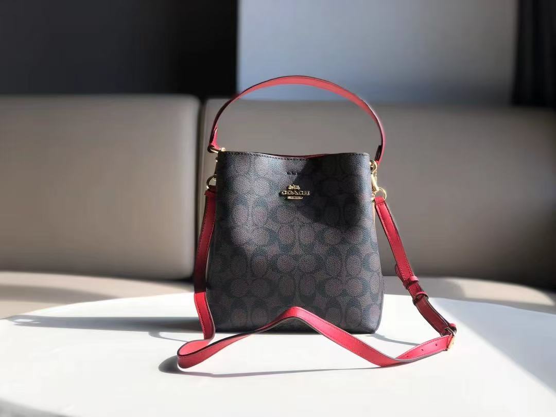11e91a803b2cd2075610bb6dd3b8b542 COACH Signature Bucket Bag – black Monogram Canvas, Brown Leather Trim, Adjustable Strap, Designer Crossbody Bag - 图片 1