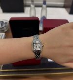 Cartier Santos-Dumont – Women's Stainless Steel Watch with White Dial, Roman Numerals, and Integrated Bracelet