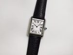 Cartier Tank Solo – Women's Stainless Steel Watch with White Dial, Roman Numerals, and Black Leather Strap