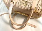Miu Miu-Style Mini Dome Bag – Iconic Metal Strap Detail, Embossed Logo, Premium Leather Handbag with Detachable Shoulder Strap - 图片 12