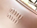 Miu Miu-Style Mini Dome Bag – Iconic Metal Strap Detail, Embossed Logo, Premium Leather Handbag with Detachable Shoulder Strap - 图片 2