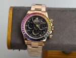 Luxury Rainbow Daytona-Style Chronograph Watch – Rose Gold Case, Multicolored Gemstone Bezel, Black Dial with Three Sub-Dials