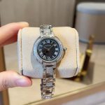 Cartier Ballon Bleu – Women's 18K White Gold Diamond-Paved Watch with Black Dial, Roman Numerals, and Integrated Bracelet