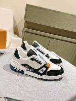 Louis Vuitton White & Black Sneakers with Blue Accents – Bold Contrast, Signature Details, Modern Luxury