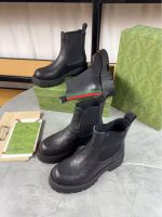 Gucci Black Embossed Leather Chelsea Boots – Web Stripe Detail, Chunky Sole, Iconic Craftsmanship