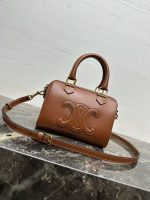 Celine Classic Leather Bowling Bag – Iconic Embossed Double C Logo, Smooth Leather, Designer Top-Handle Bag with Detachable Strap